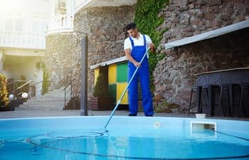 cleaning a swimming pool