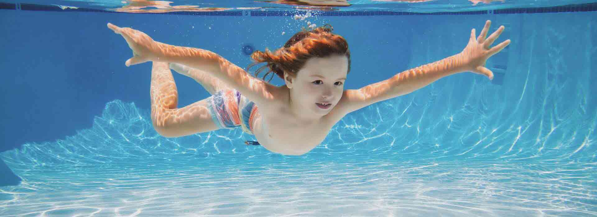 A child swimming in a pool