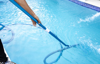 pool maintenance and cleaning with vacuum hose